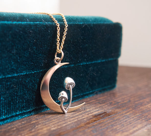 Crescent moon and mushroom necklace