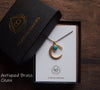 Gold crescent moon with turquoise necklace and brass chain in curious oddities gift box