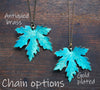 Large verdigris green maple leaf necklace in gold and antiqued brass 