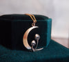Crescent moon and mushroom silver and gold ecklace