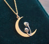 Silver and gold moon and mushroom pendant