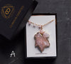 Pink agate leaf necklace in Curious Oddities gift box