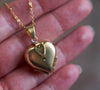 Brass heart locket keepsake on long gold chain