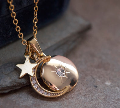 Gold moon locket necklace 