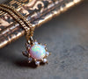 Opal gold celestial sun necklace
